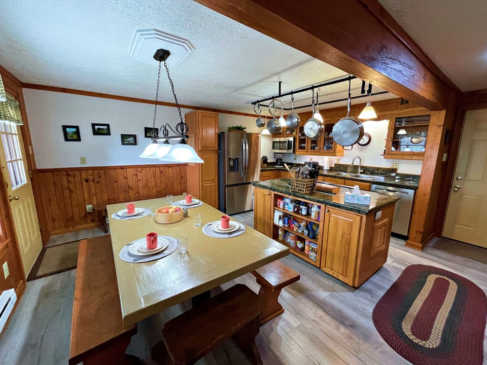 The kitchen is fully equipped with cookware, dishes, and dining essentials—just bring your favorite ingredients.