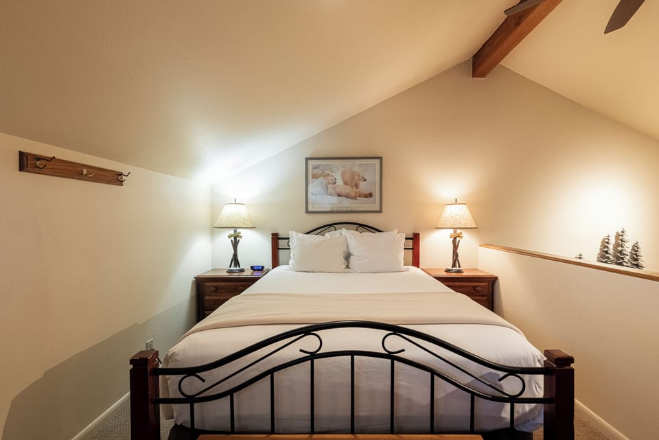 Upstairs Loft Twin bunk, single twin, and queen bed with a shared bathroom in the main level