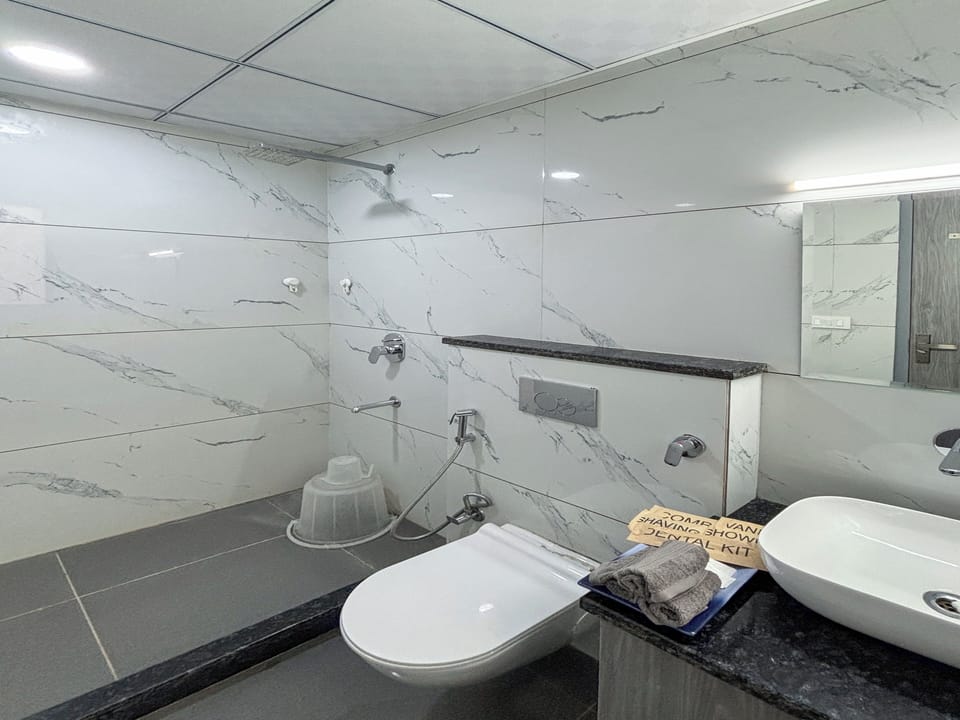 Studio, City View | Bathroom | Shower, free toiletries, slippers, bidet