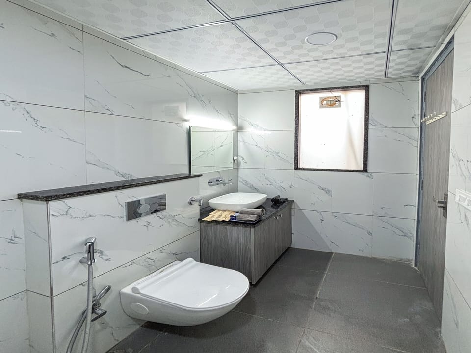 Studio, City View | Bathroom | Shower, free toiletries, slippers, bidet