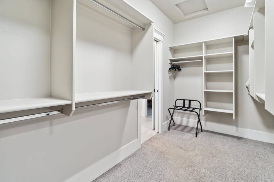 Master walk-in closet with convenient access to laundry room