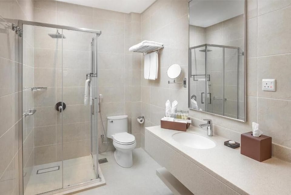 Shower, free toiletries, hair dryer, slippers