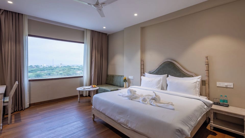 Premium bedding, in-room safe, iron/ironing board (on request)