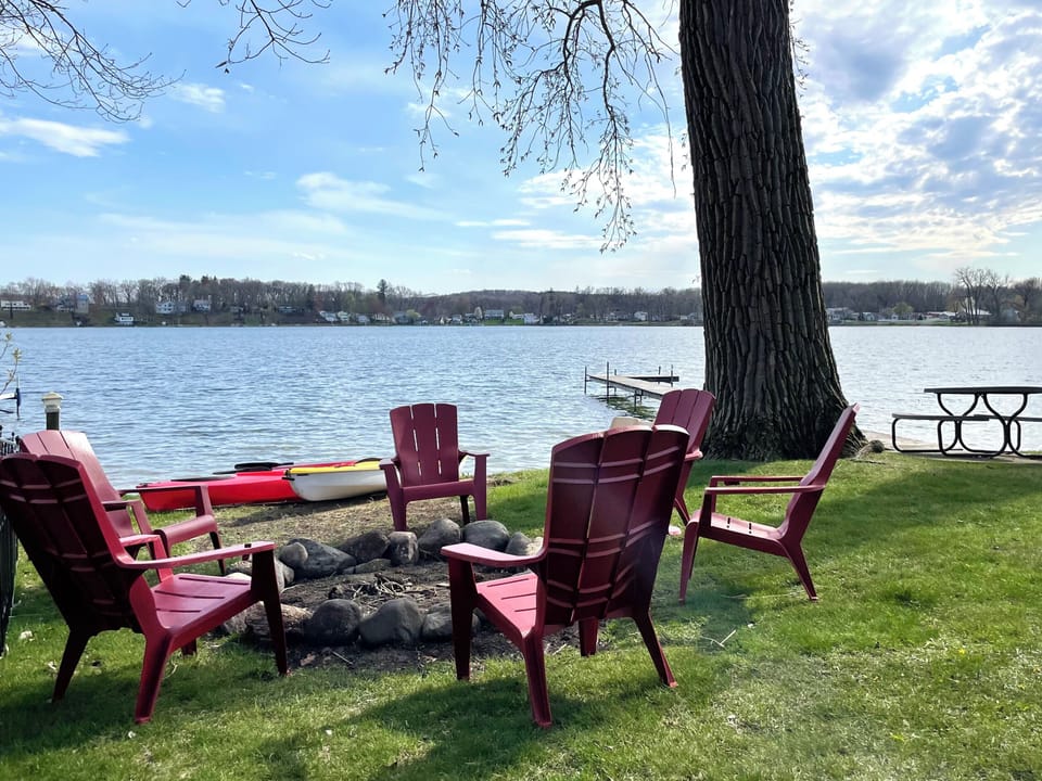 Paradise at Pier 124: Unwind by the fire pit with stunning lake views—perfect for cozy evenings with family and friends.