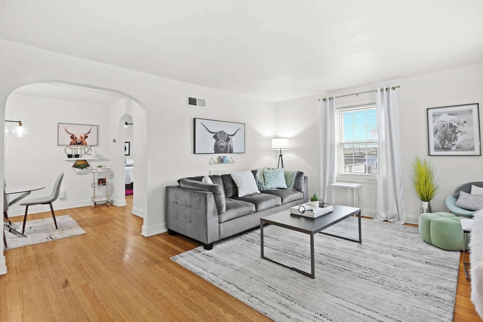 Living Room: Unit 3 - Get comfortable and relax on our plush sofa, surrounded by stylish decor that creates a homey atmosphere in the room.