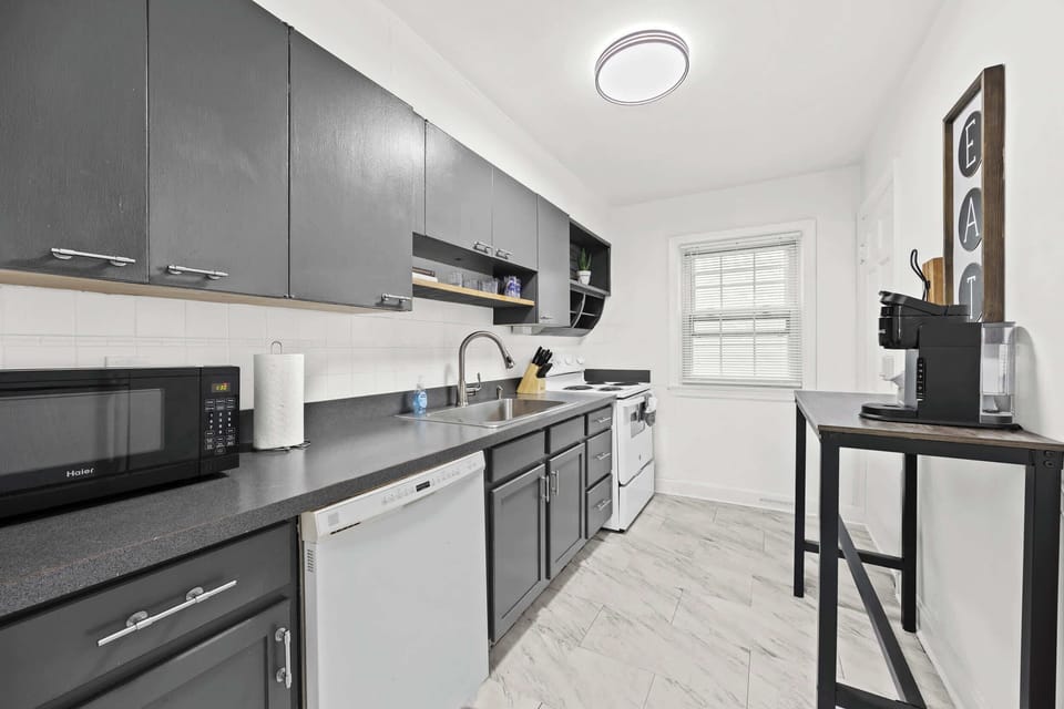 Kitchen: Unit 2 - Bright and functional, this kitchen makes cooking a breeze during your stay