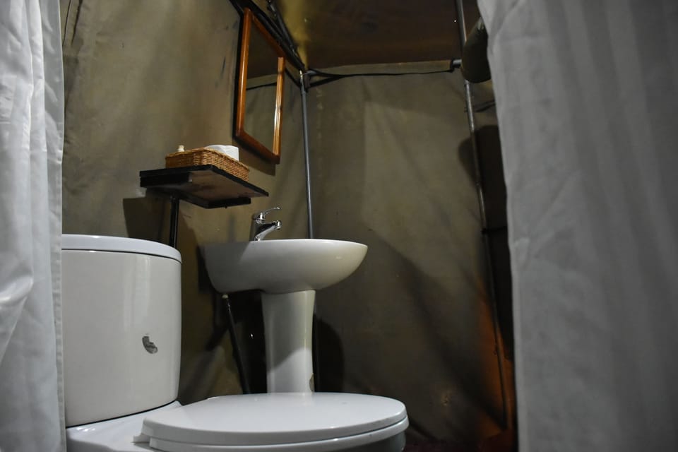 Shower, free toiletries, slippers, towels