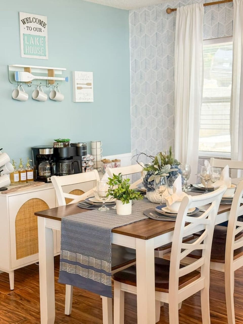 A cozy indoor coffee corner beside a four-seater dining area with Keurig and a drip coffee maker, perfect for morning rituals or relaxed conversations. Comfort and charm in your own space.
