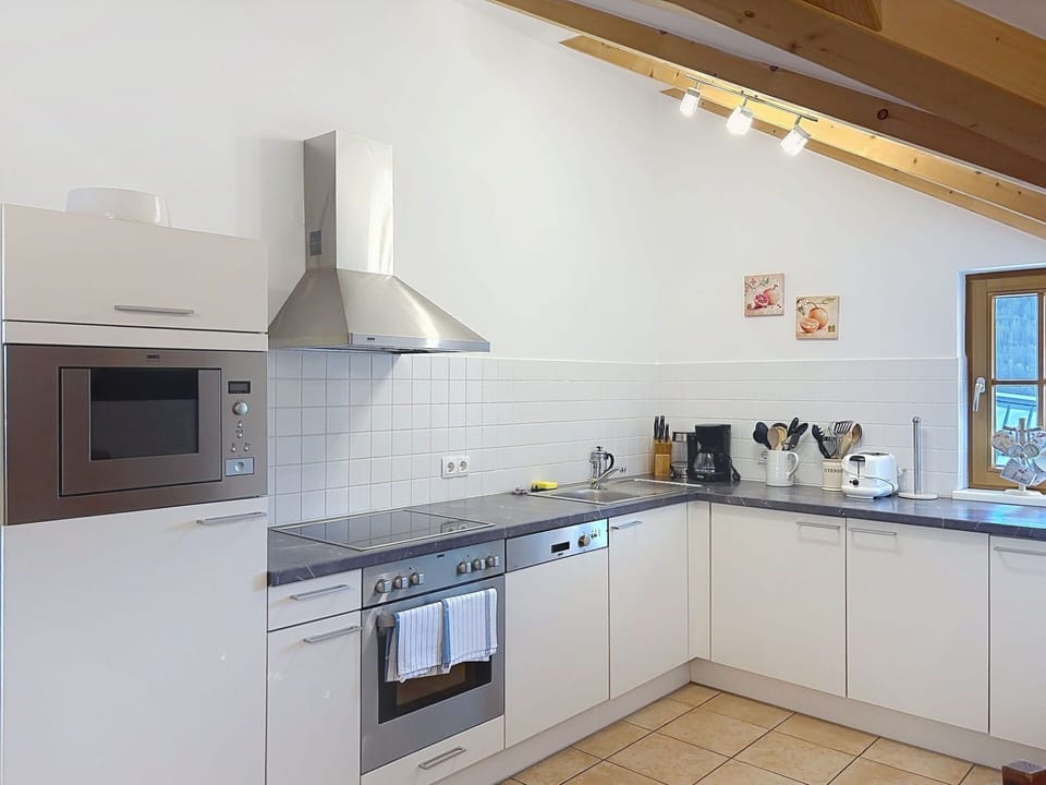 Kitchen, Kitchen Appliance, Countertop, Cabinetry, Flooring, Interior Design, Major Appliance, Floor, Furniture, Kitchen Stove