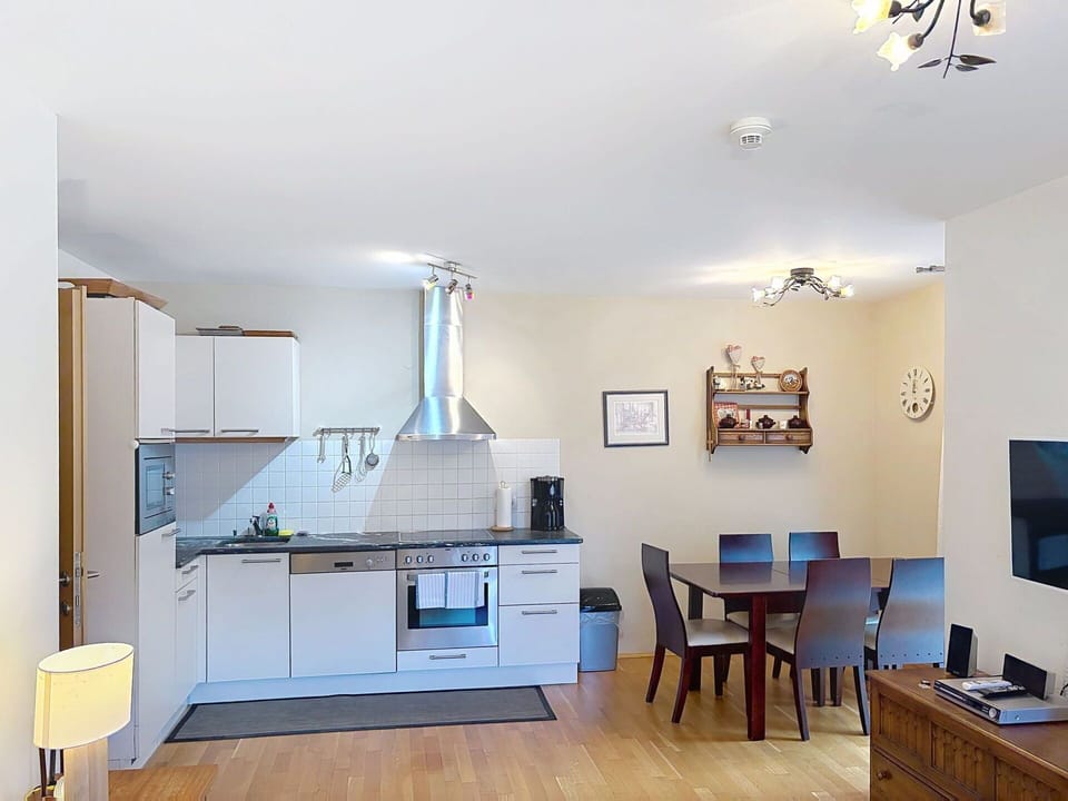 Furniture, Interior Design, Flooring, Floor, Wood, Ceiling, Wood Flooring, Room, Light Fixture, Cabinetry