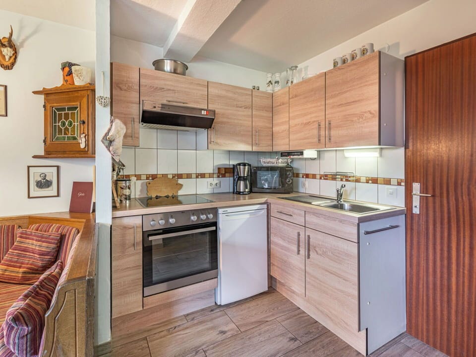 Furniture, Kitchen, Interior Design, Wood, Cabinetry, Kitchen Appliance, Major Appliance, Flooring, Countertop, Floor