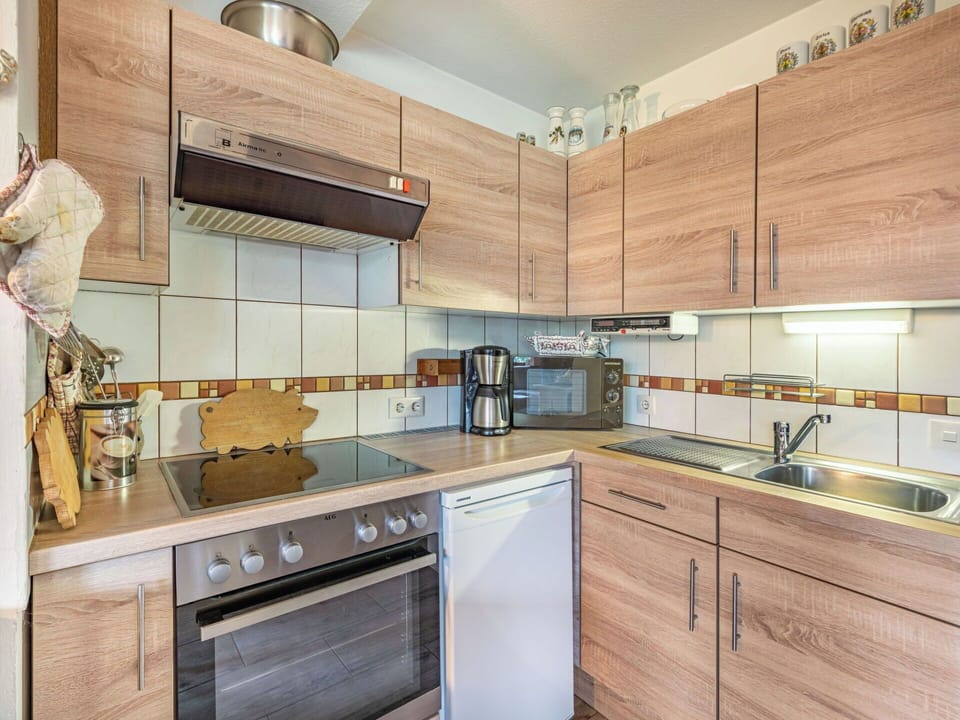 Kitchen, Countertop, Kitchen Appliance, Cabinetry, Major Appliance, Furniture, Flooring, Wood, Interior Design, Sink