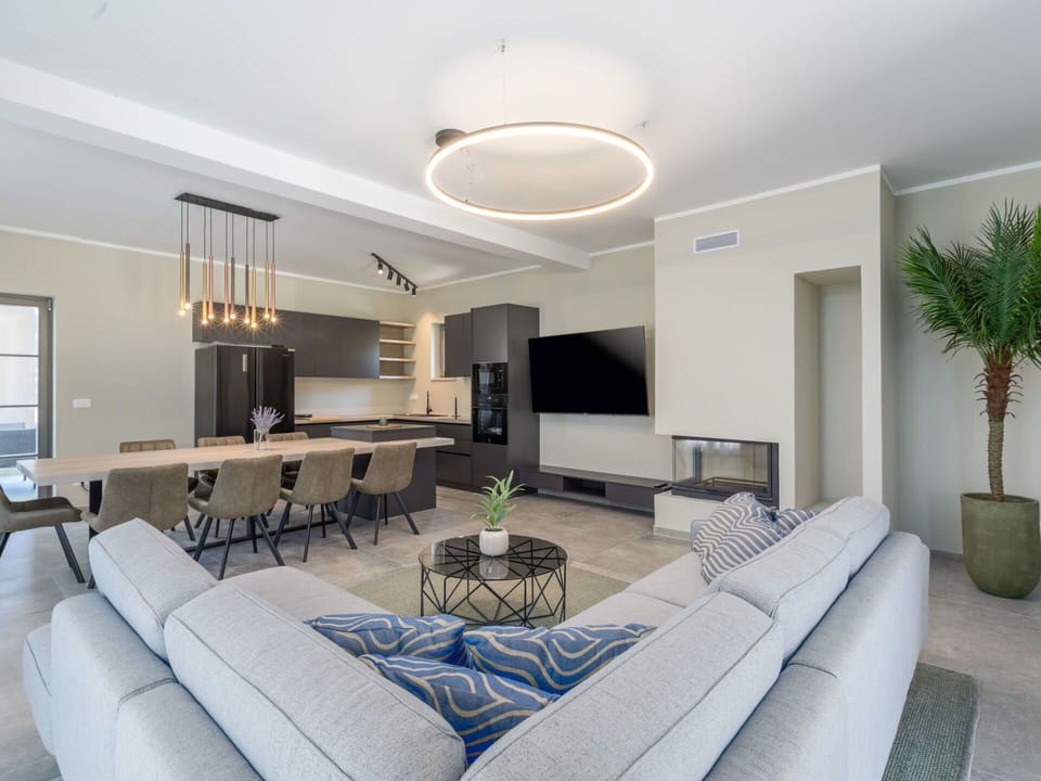 Interior Design, Flooring, Ceiling, Furniture, Wood, Floor, Light Fixture, Living Room, Lighting, Couch