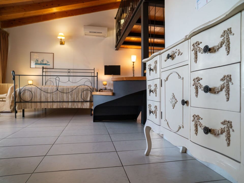 Furniture, Interior Design, Flooring, Floor, Ceiling, Room, Lighting, Light Fixture, Bed, Home