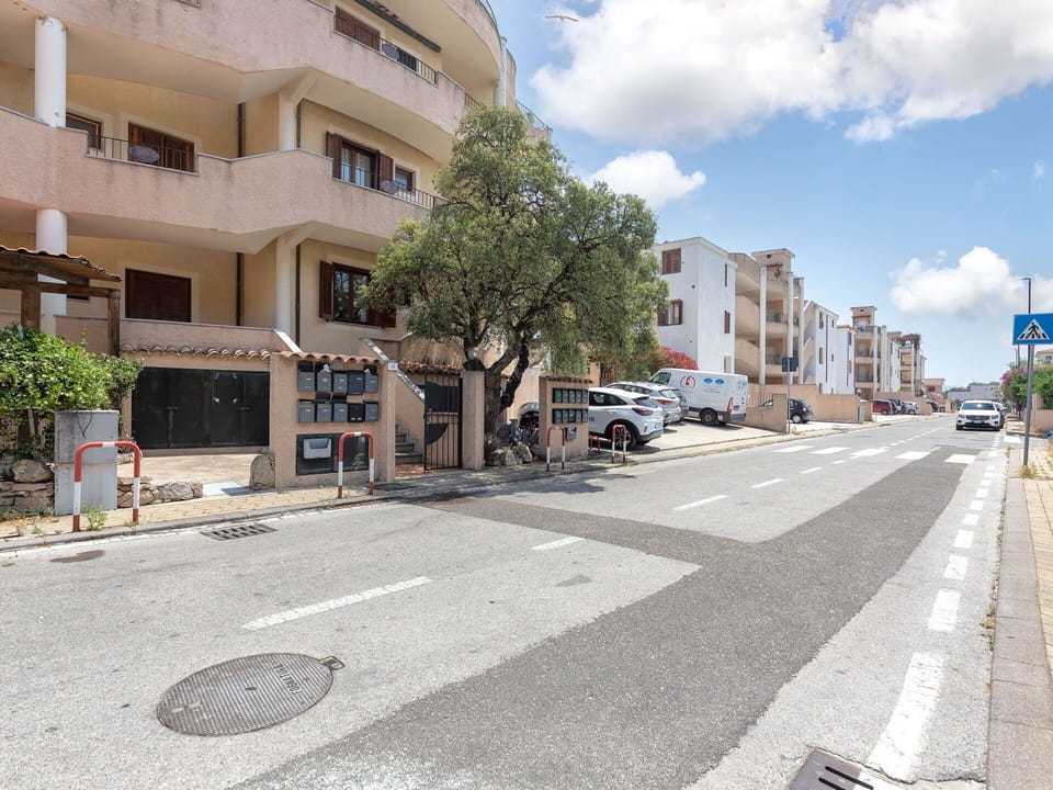 Building, Window, Apartment, City, Car, Automotive Exterior, Residential Area, Neighbourhood, Road, Town