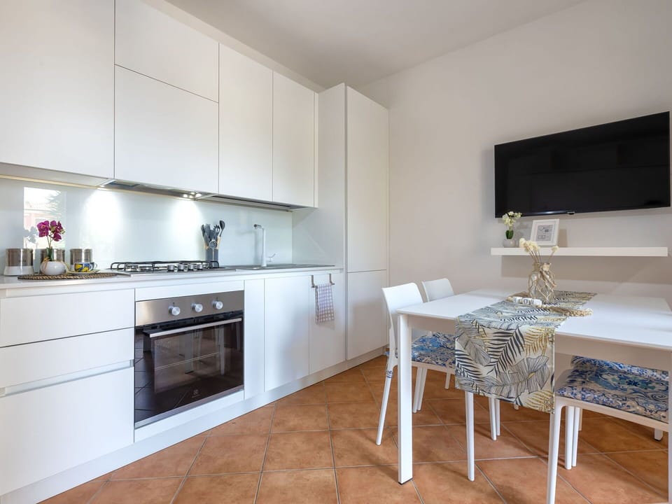 Interior Design, Kitchen, Flooring, Kitchen Appliance, Major Appliance, Wood, Furniture, Countertop, Floor, Cabinetry