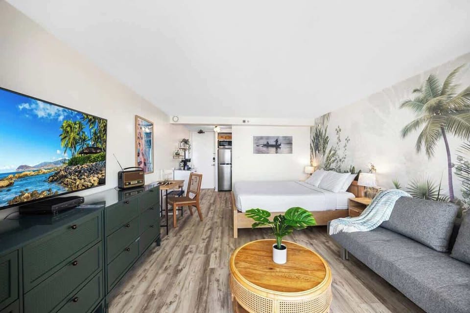 This studio has everything you need! A 54" Smart TV, a futon sofa that can be used as a bed, and a comfortable queen-size bed!