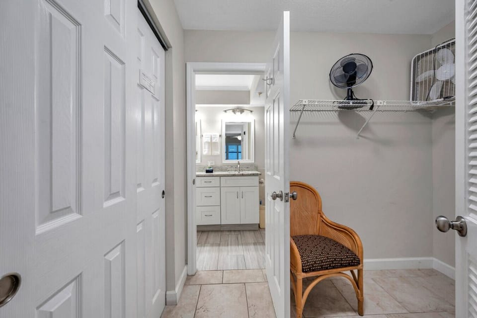 Bathroom entry w/ clean lines & easy access from the bedroom.