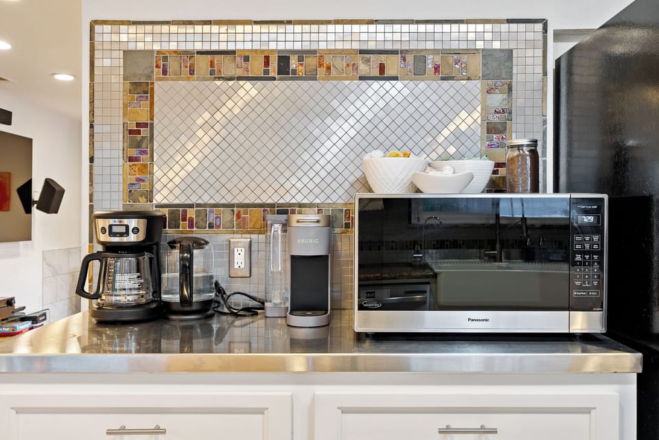Kitchen - A stunning backsplash makes a cup of coffee or microwave meal even more delightful!