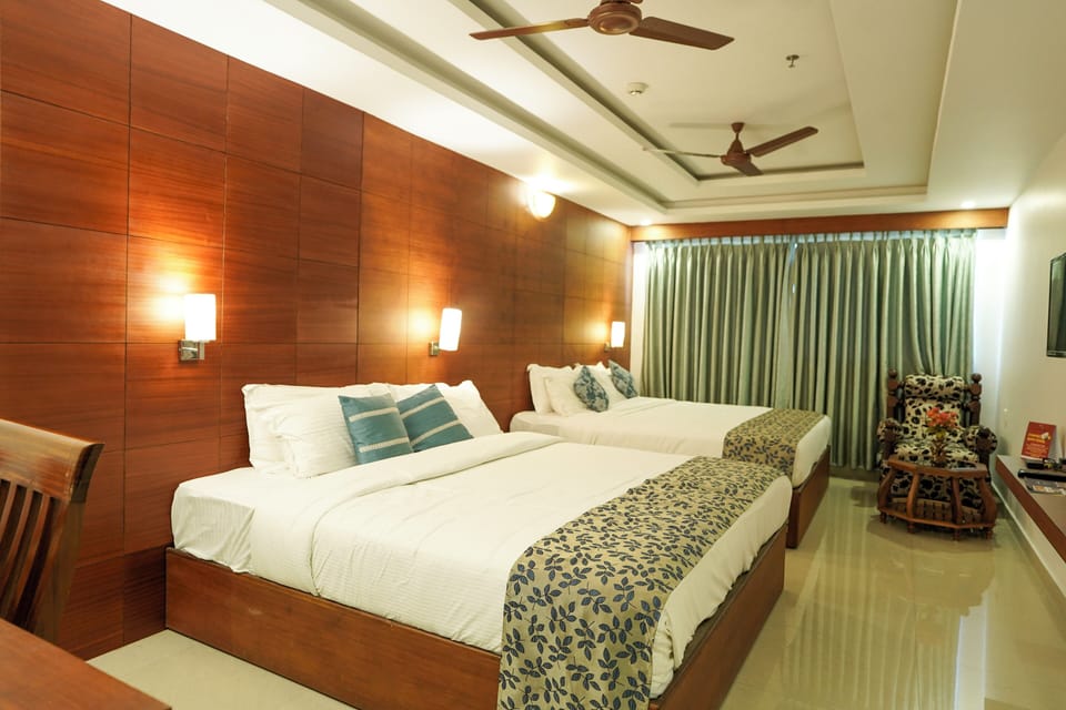 Comfort Quadruple Room, City View | Desk, laptop workspace, iron/ironing board, free WiFi