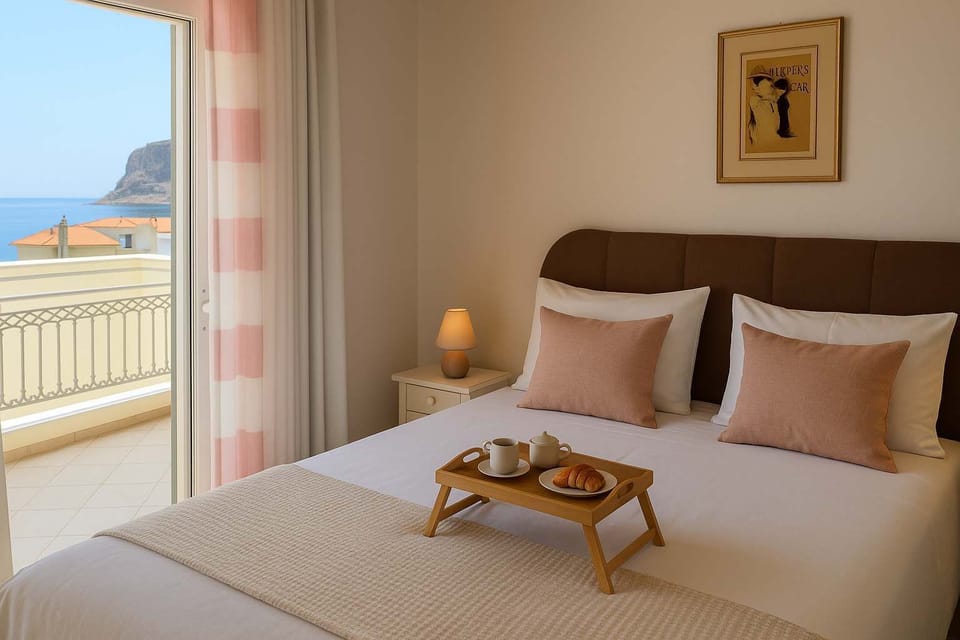 Wake up to sea views and sunshine in this serene, modern bedroom.