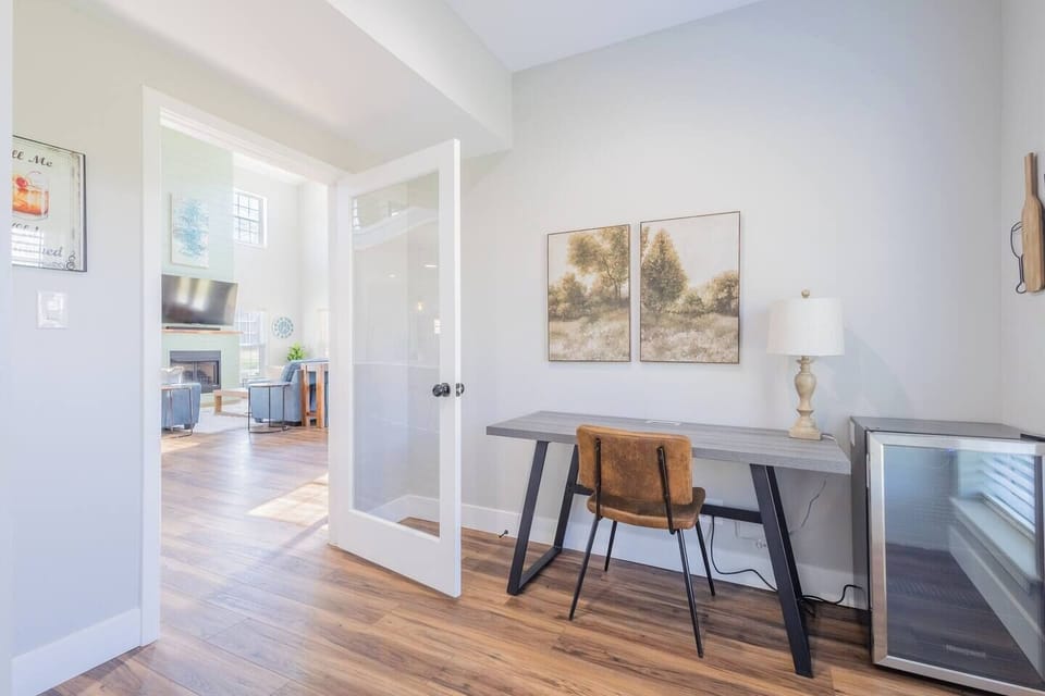 Private Home Office – A dedicated workspace with a sleek desk, comfy chair, private mini fridge, and soft lighting. Perfect for remote work or planning your next adventure.