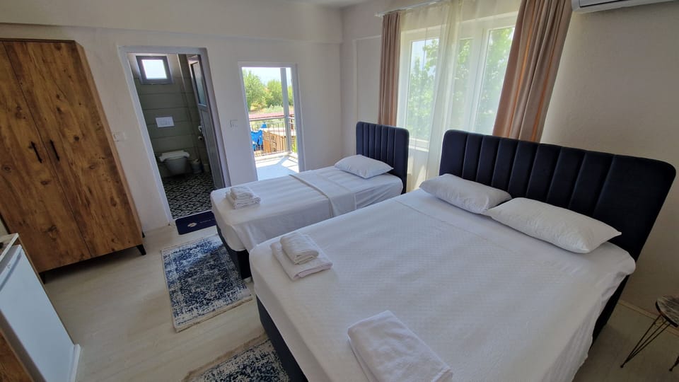 Premium bedding, Select Comfort beds, laptop workspace, bed sheets