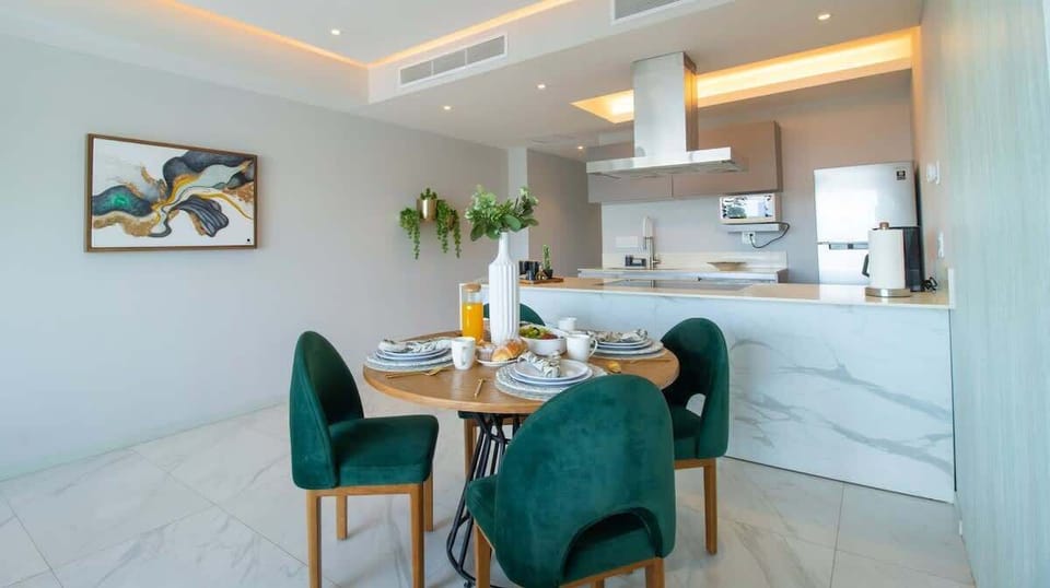 Enjoy a sit-down meal at home at this elegant dining table