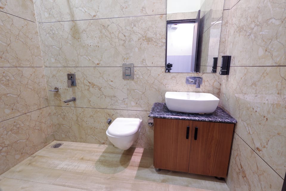 Deluxe Double Room, City View | Bathroom | Shower, slippers, towels, soap