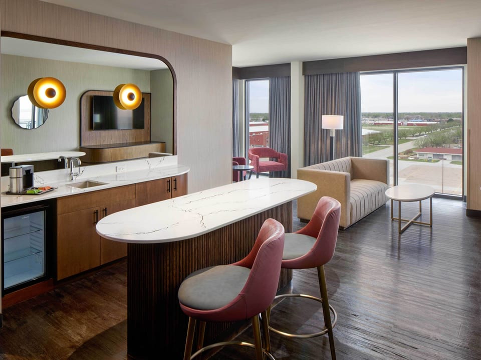 Suite (King Suite) | Living area | 45-inch flat-screen TV with satellite channels, pay movies