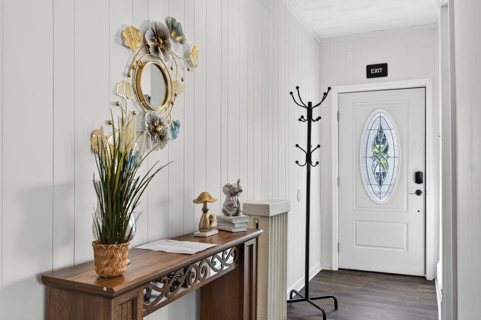 Step into this chic entryway—hang your coat and start your relaxing stay.