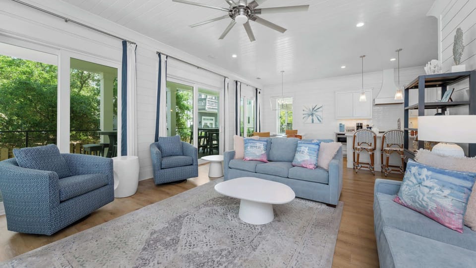 This living area seats 8, and is the perfect spot to unwind after a long day of beach adventures. 