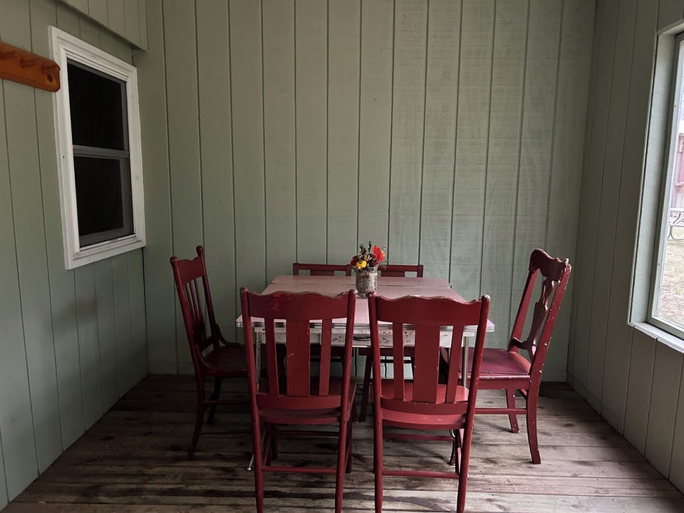 Front porch with dining table. 