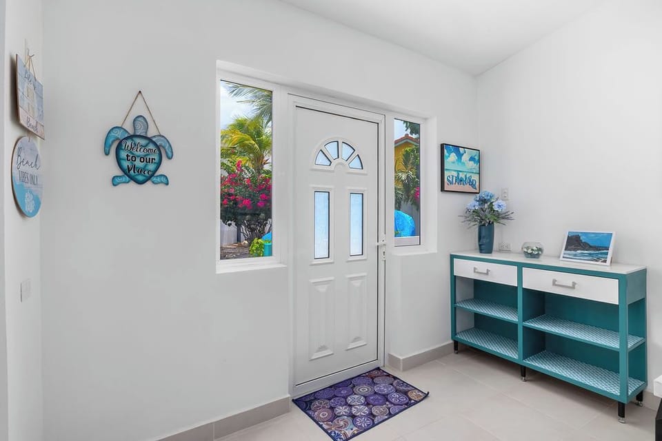 Natural light pours in through large windows, while a Smart TV with Netflix and cozy swivel chairs make it the ideal spot for movie nights, reading, or gathering with loved ones.