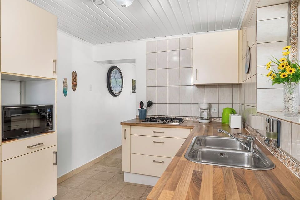 Each poolside apartment features a full kitchen and dining area, ideal for guests who enjoy privacy or separate mealtime routines.