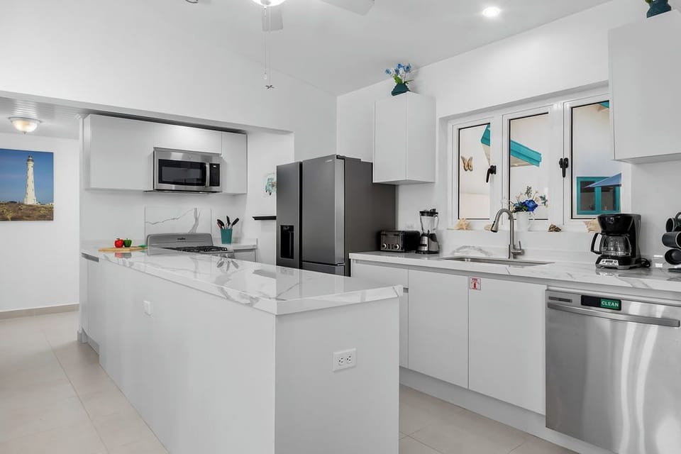 Each poolside apartment features a full kitchen and dining area, ideal for guests who enjoy privacy or separate mealtime routines.