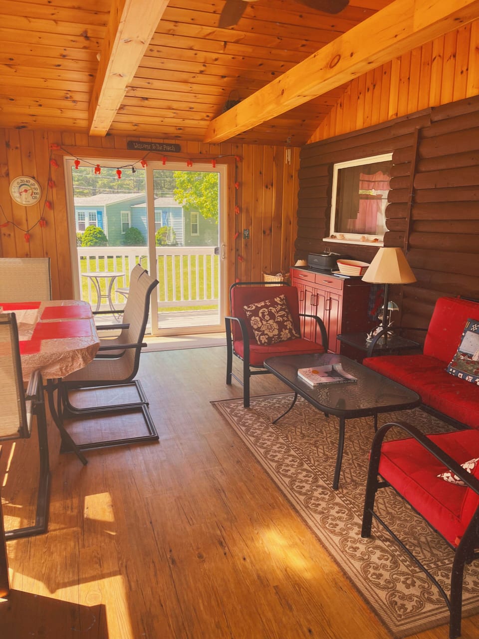 Large enclosed sun-room great for dinner time or puzzles! A/C keeps it cool.