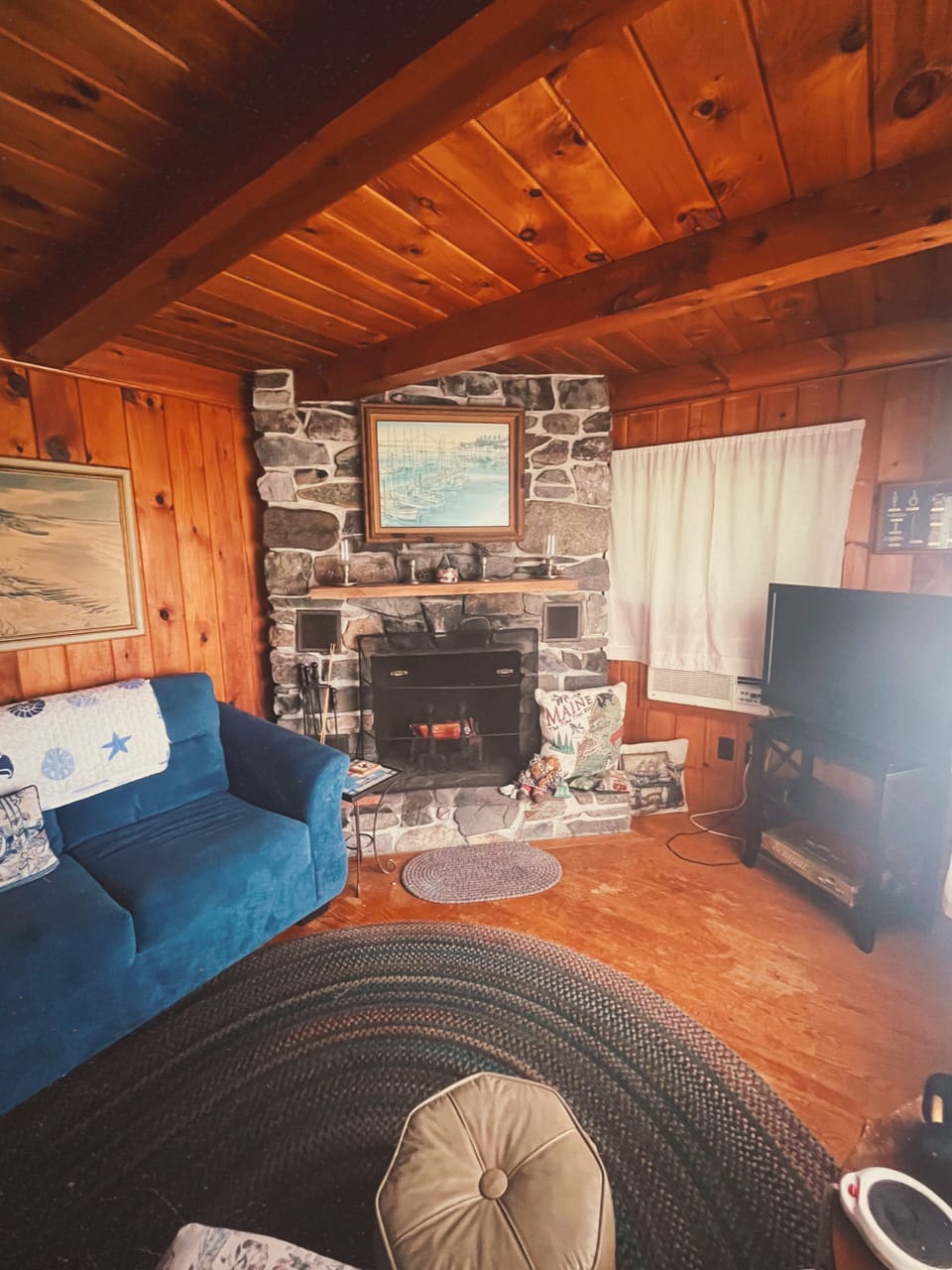 Fireplace has a safe electronic candle arrangement perfect for any mood.