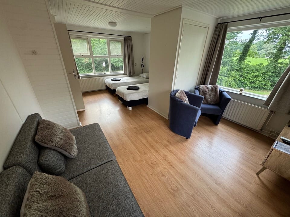 Apartment, Multiple Beds, Kitchenette, Garden View | Blackout drapes, soundproofing, free WiFi