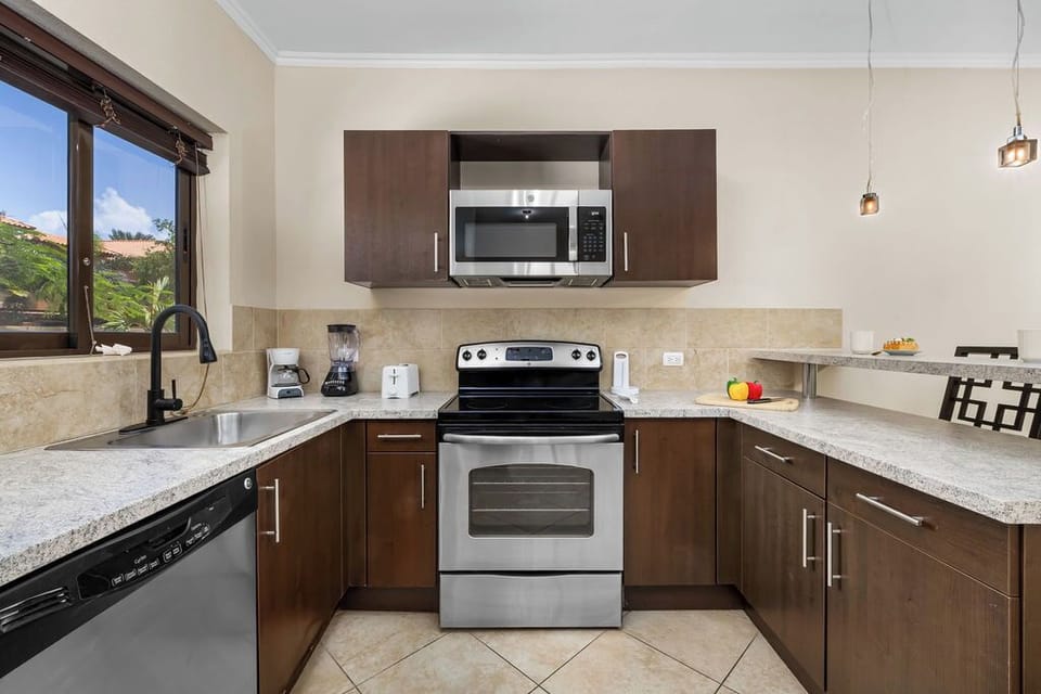 Whip up culinary delights! Our fully equipped kitchen has everything you need to prepare delicious meals during your stay.