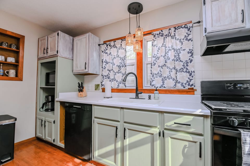 kitchen sink, knives, new appliances including dishwasher, microwave, stove/oven