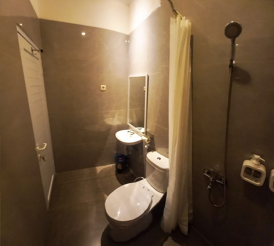 Shower, slippers, towels, soap