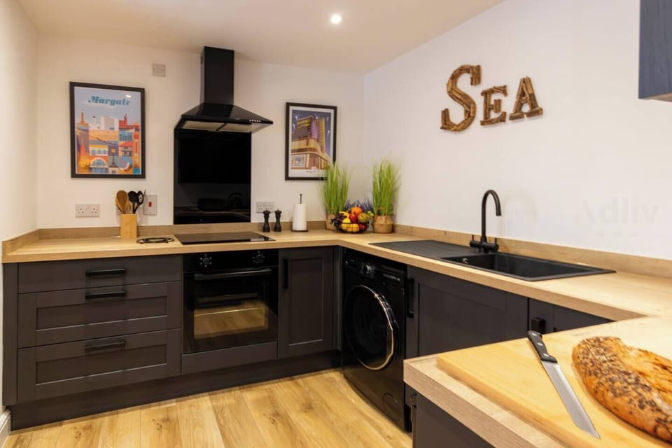 Welcome Touches -, Coastal-themed wall art, and ambient lighting add character and charm throughout.
