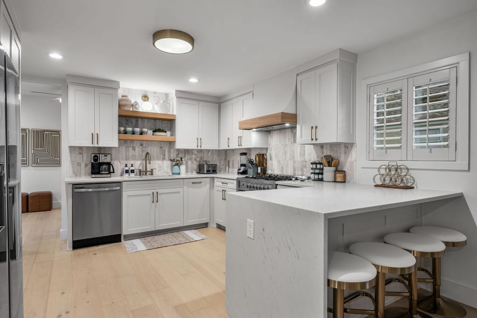 A chef's dream kitchen that is fully stocked for all your cooking needs!
