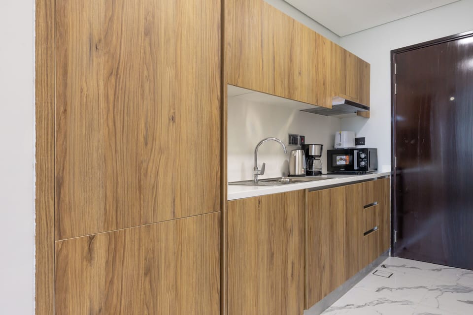 Deluxe Studio, Balcony, City View | Private kitchen | Electric kettle