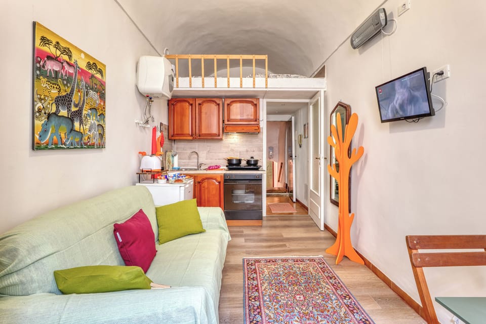 Standard Apartment, Multiple Bedrooms, 2 Bathrooms (Aurora La Petite Maison) | Living area | 21-inch TV with cable channels