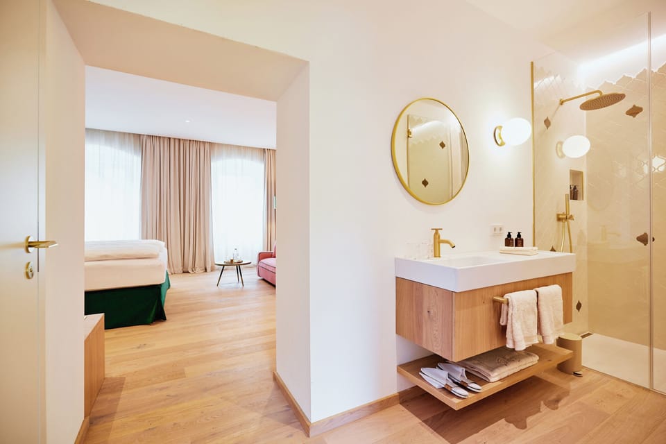 Superior Suite, Balcony, Courtyard View | In-room safe, blackout drapes, soundproofing, iron/ironing board