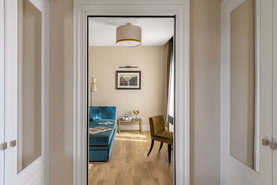 Executive Suite, Balcony, City View | Living area | LCD TV