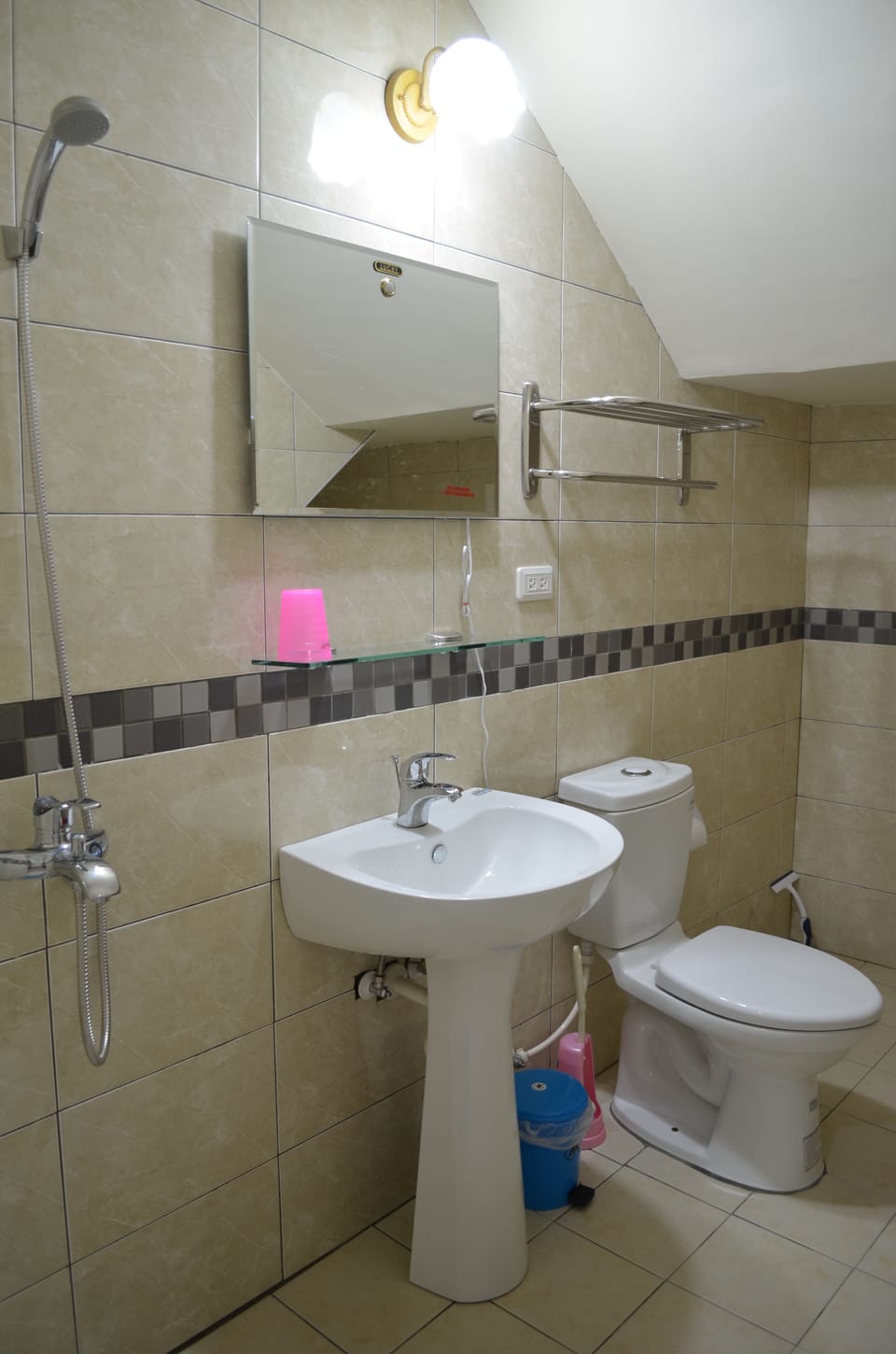 Shower, free toiletries, hair dryer, slippers