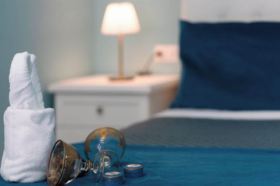 Family Quadruple Room, City View | Minibar, desk, free WiFi, bed sheets